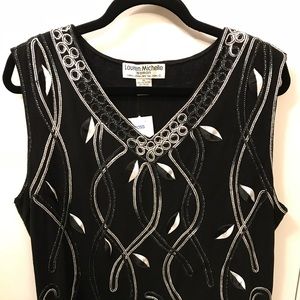 NWT Dressy black and white sleeveless blouse